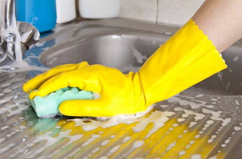 Professional staff handling garments at Zara Cleaners