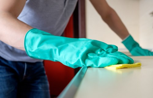 Zara Cleaners team cleaning hardwood floors